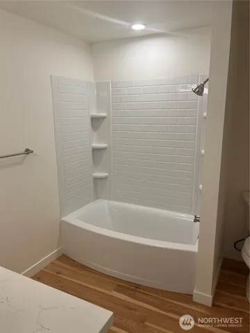 a bathroom with a bathtub