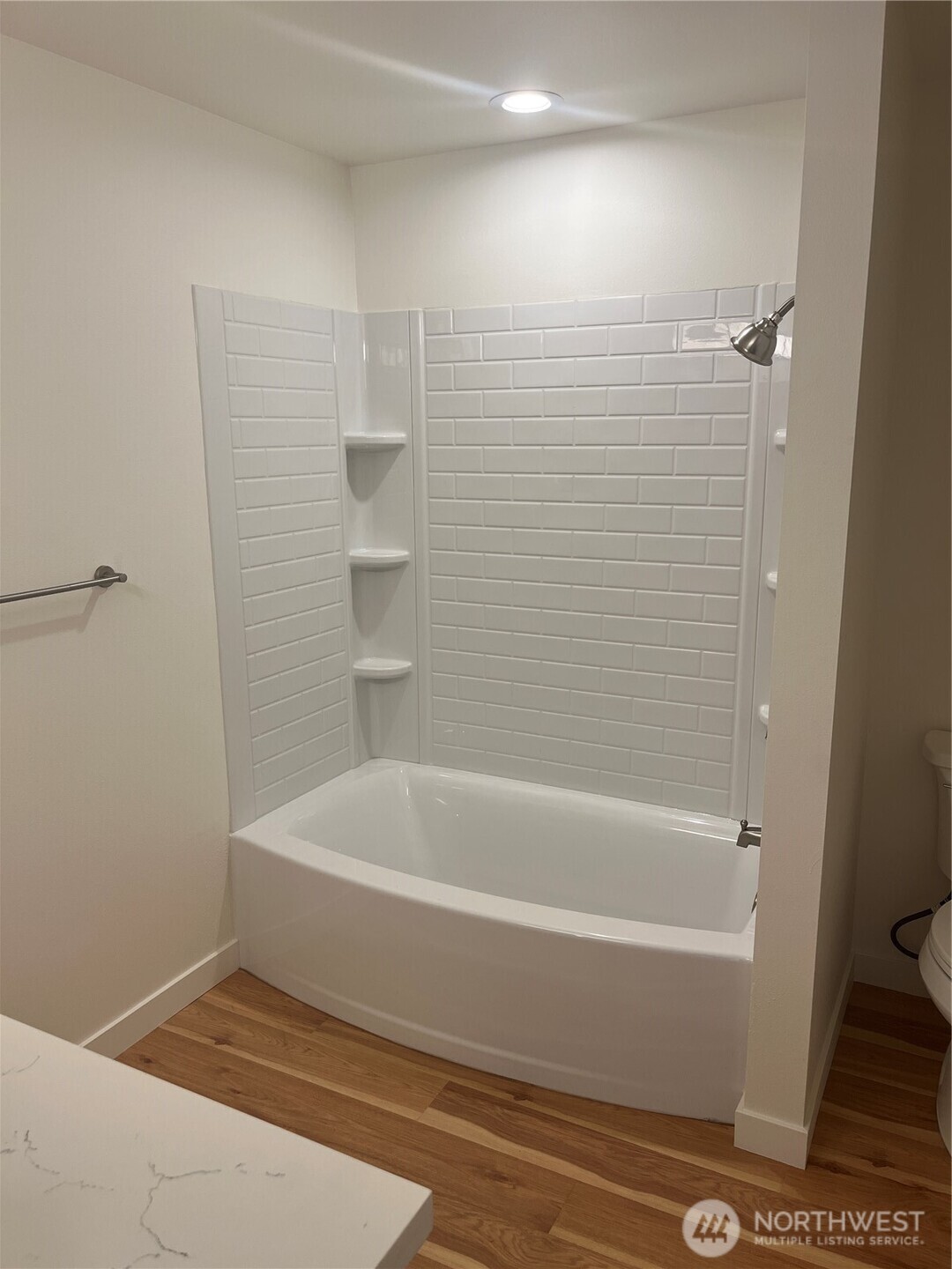 411 170th Place Southwest, Unit 2 Bothell, WA 98012 - Photo 15 of 15 a bathroom with a bathtub