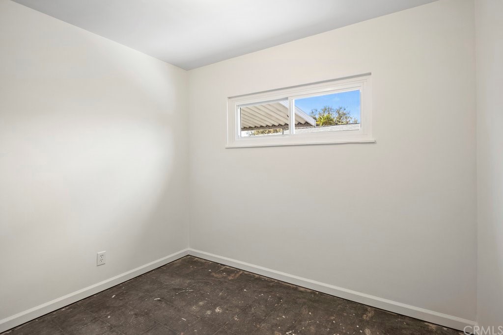 3129 Ronald Street Riverside, CA 92506 - Photo 19 of 37 an empty room with a painting on the wall