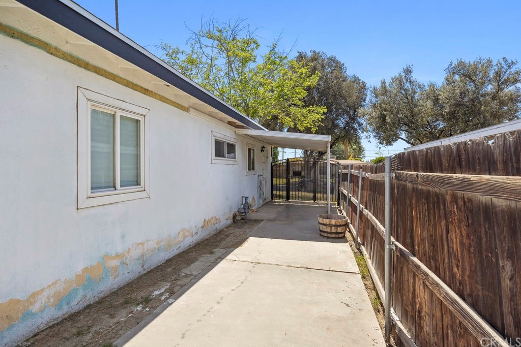 3129 Ronald Street Riverside, CA 92506 - Photo 35 of 37 a view of a house with wooden fence