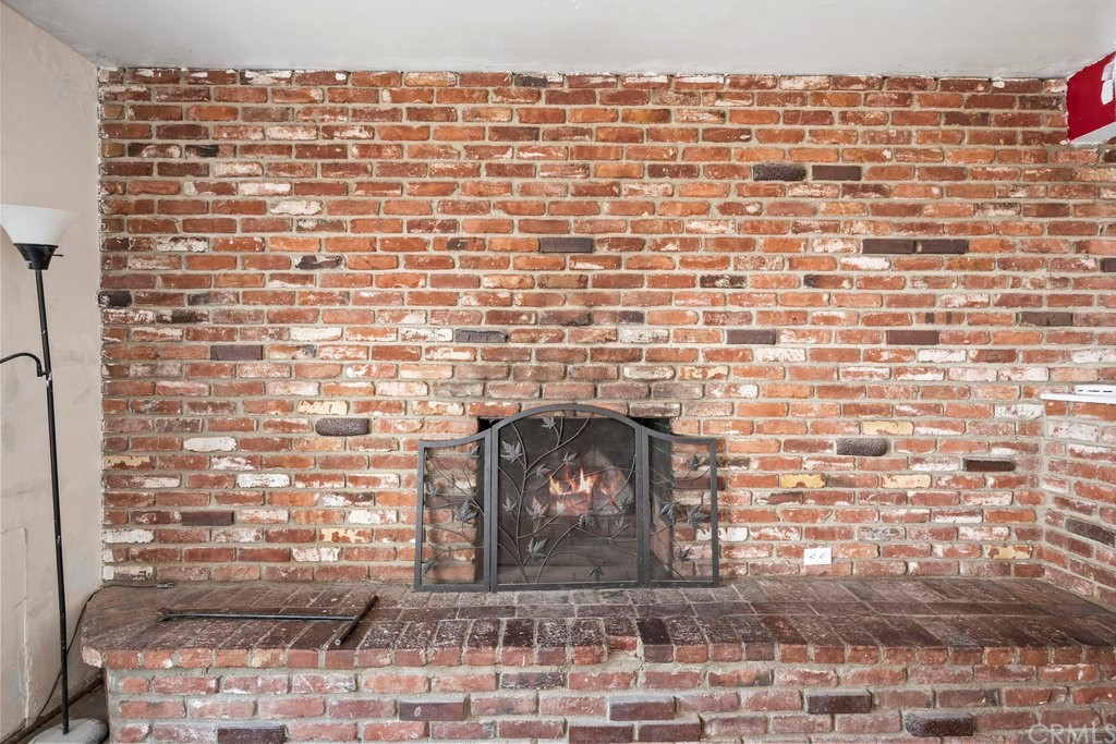 3129 Ronald Street Riverside, CA 92506 - Photo 8 of 37 a brick building with a door