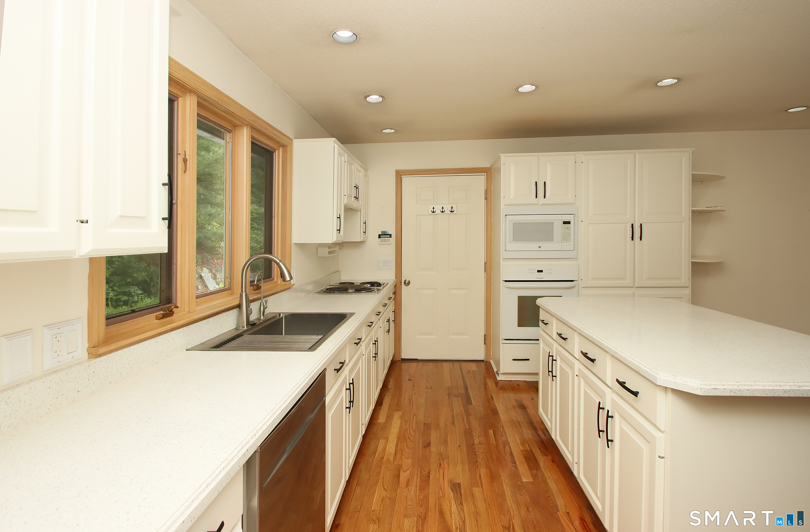 352 Center Street Wolcott, CT 06716 - Photo 12 of 40 a kitchen with a sink stove and refrigerator