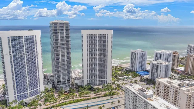 a front view of a house with outdoor seating