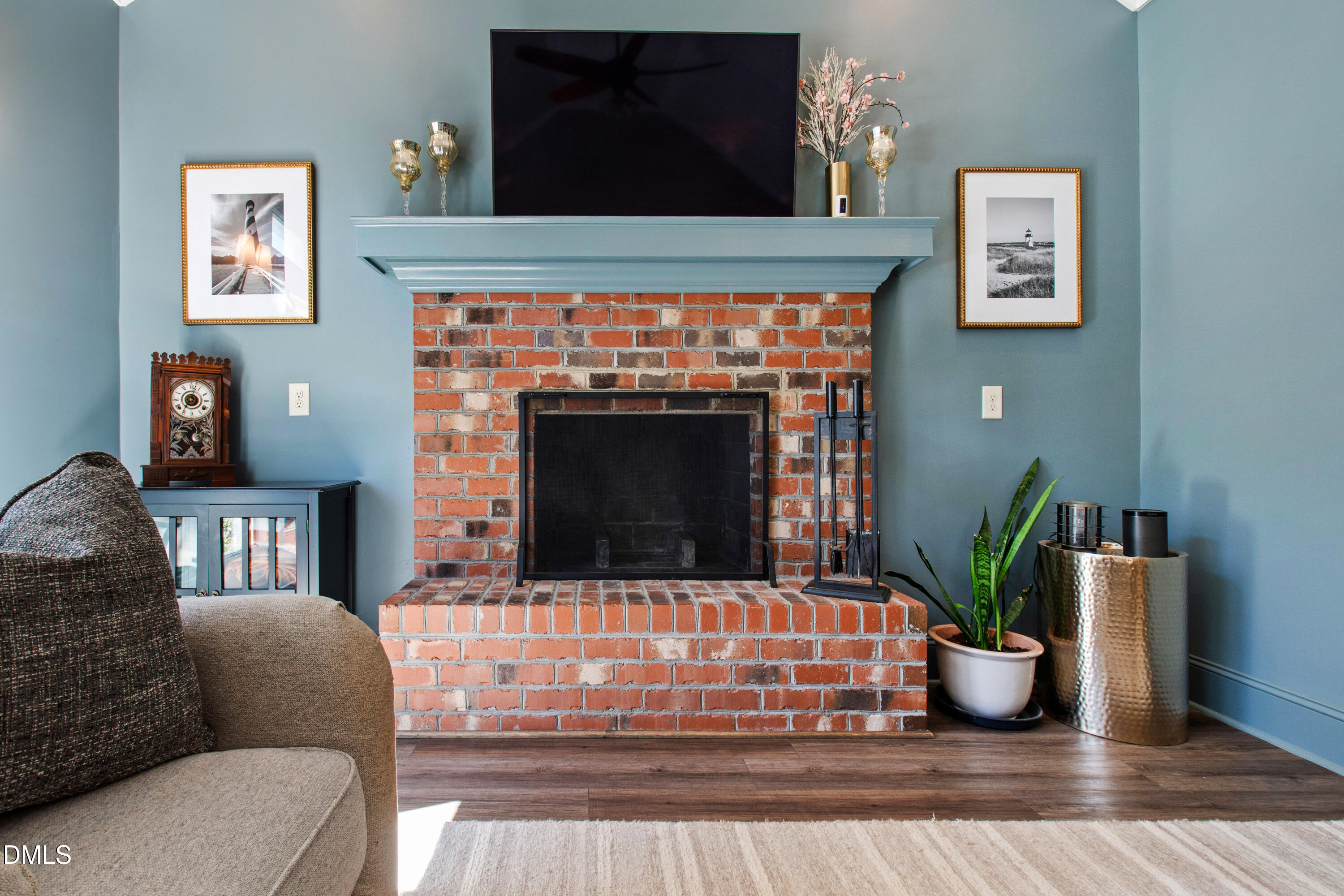 5505 Spring Road Raleigh, NC 27603 - Photo 14 of 41 a living room with furniture and a fireplace