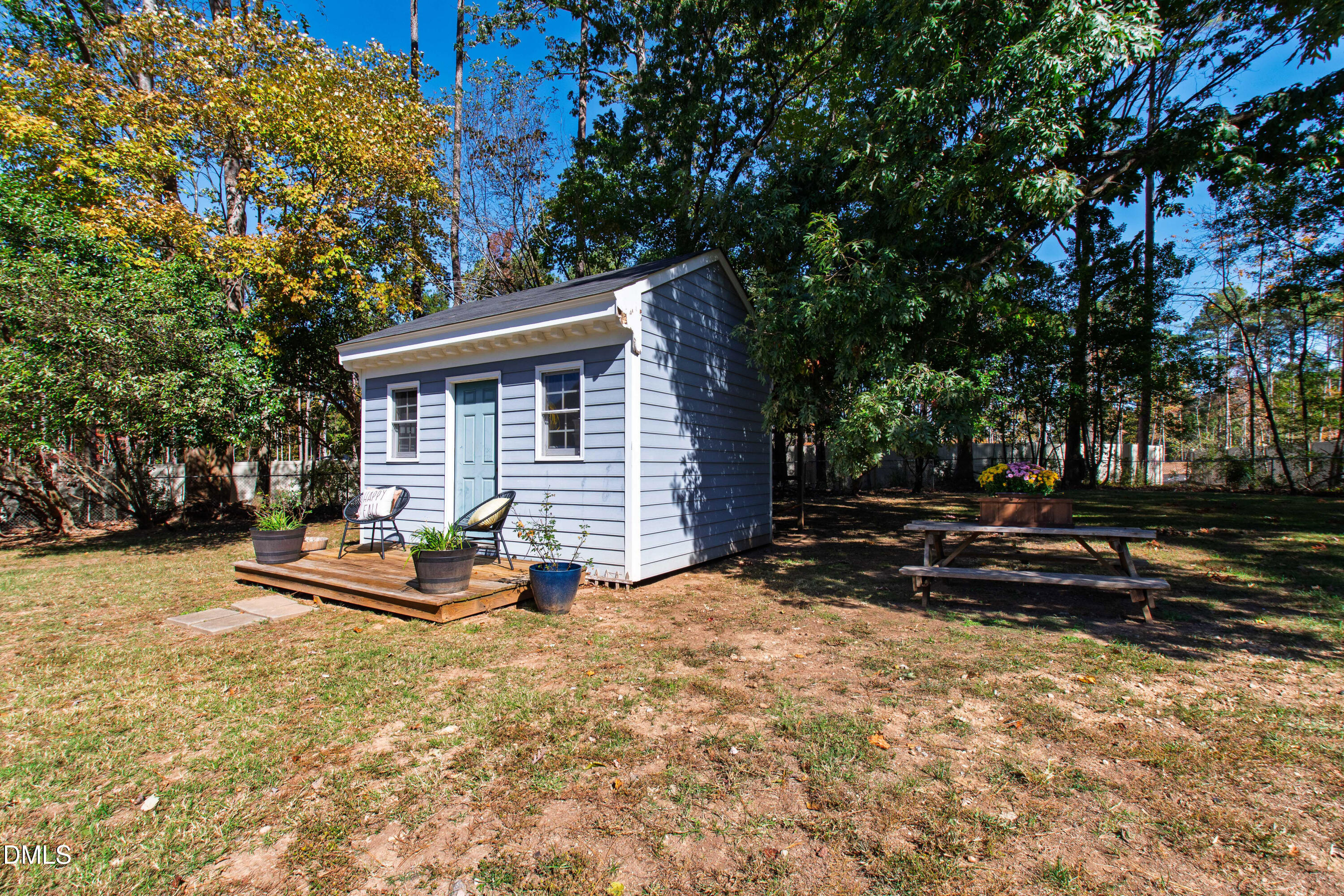 5505 Spring Road Raleigh, NC 27603 - Photo 39 of 41 a view of a house with backyard and sitting area