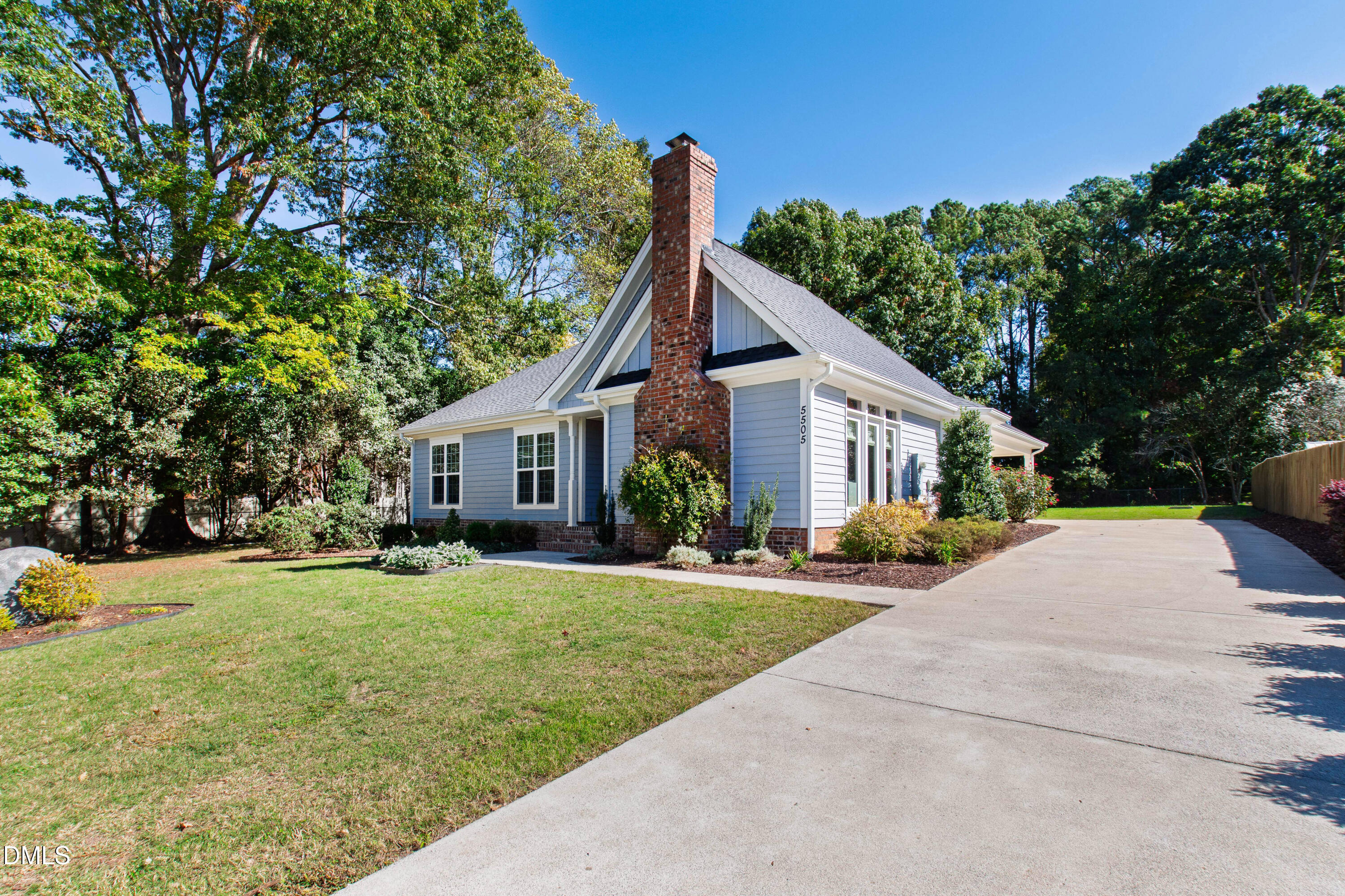 5505 Spring Road Raleigh, NC 27603 - Photo 4 of 41 a front view of house with yard and green space
