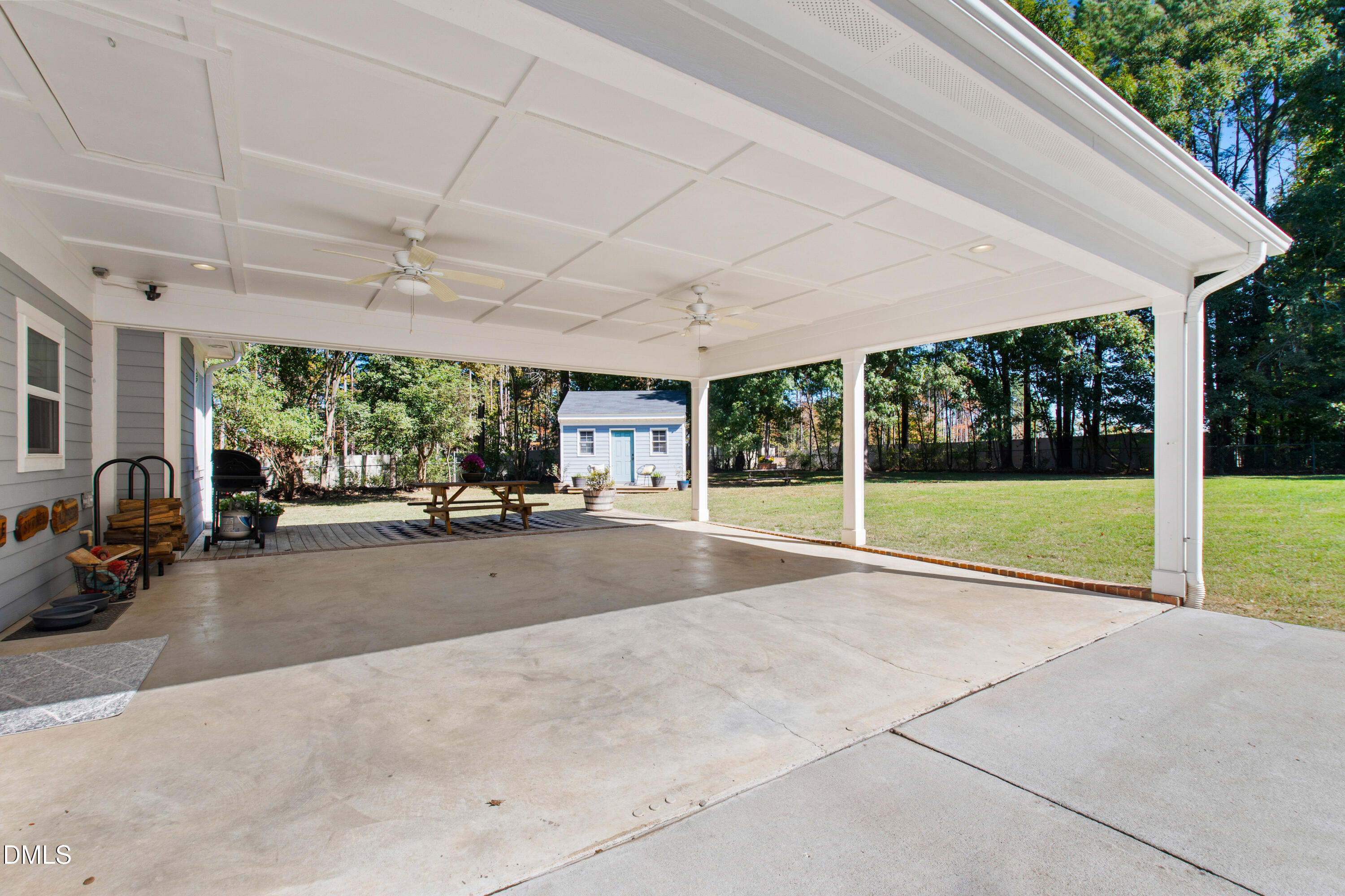 5505 Spring Road Raleigh, NC 27603 - Photo 6 of 41 a view of a patio with a backyard