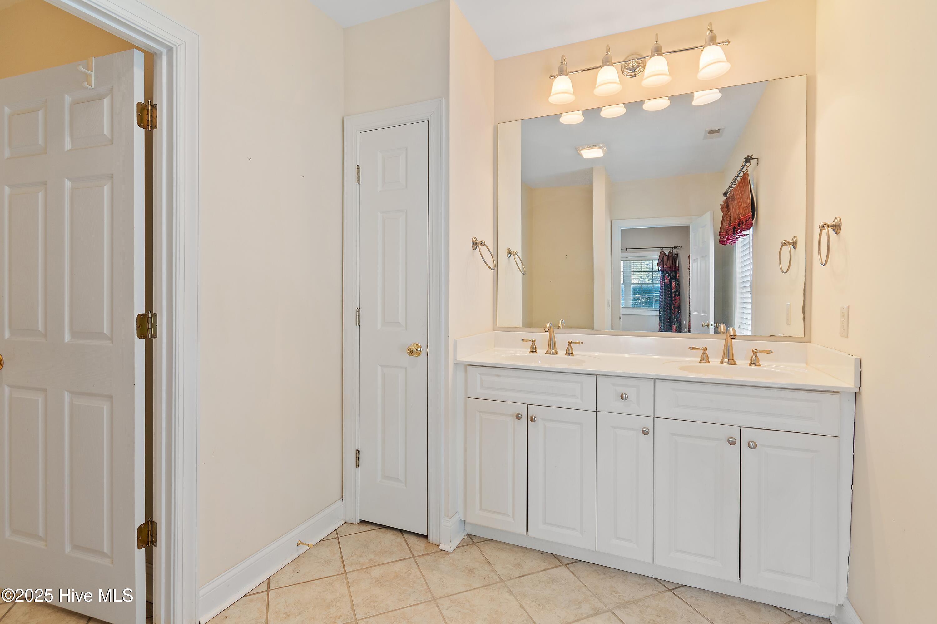 6777 Roberta Road Southwest Ocean Isle Beach, NC 28469 - Photo 68 of 89 Bath on 1st Floor to bedroom