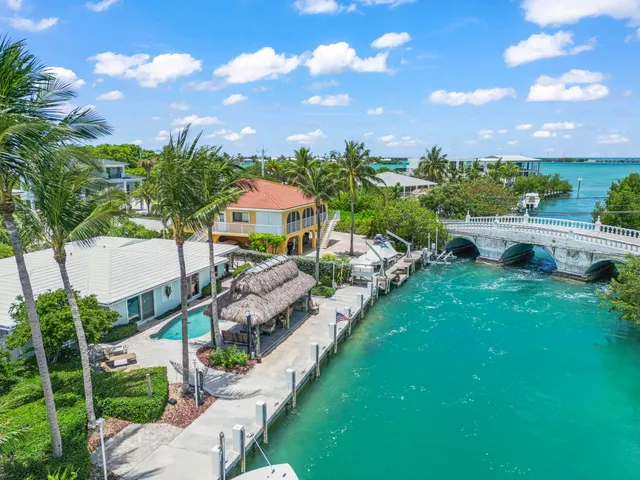 a view of a garden with houses