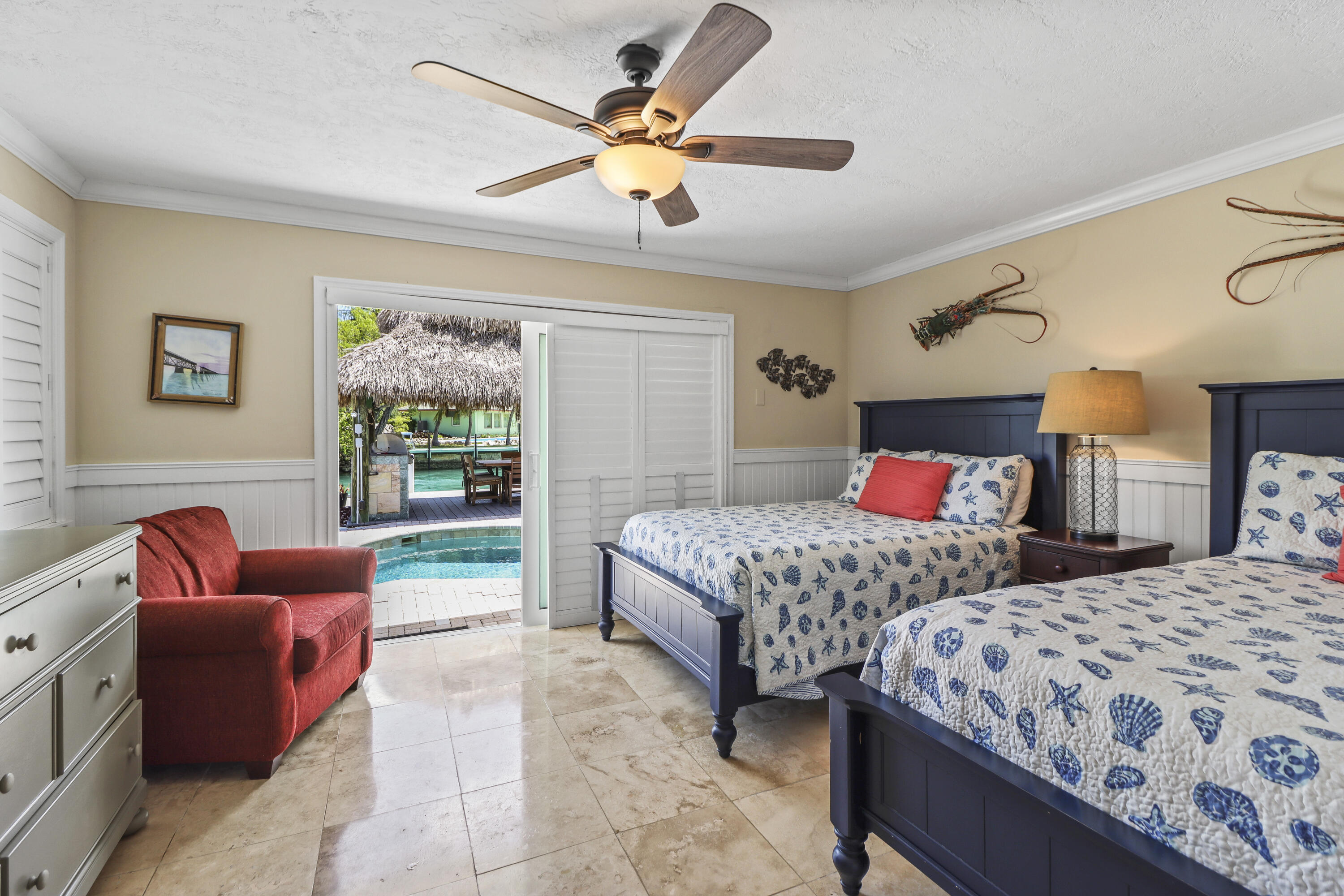 116 Indies Drive North Marathon, FL 33050 - Photo 6 of 67 2ND BEDROOM WITH POOL VIEW/CANAL VIEW