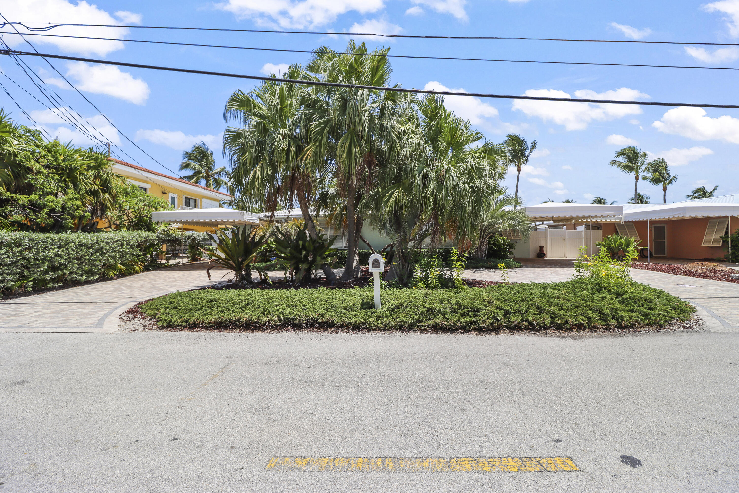 116 Indies Drive North Marathon, FL 33050 - Photo 65 of 67 a front view of a house with a yard