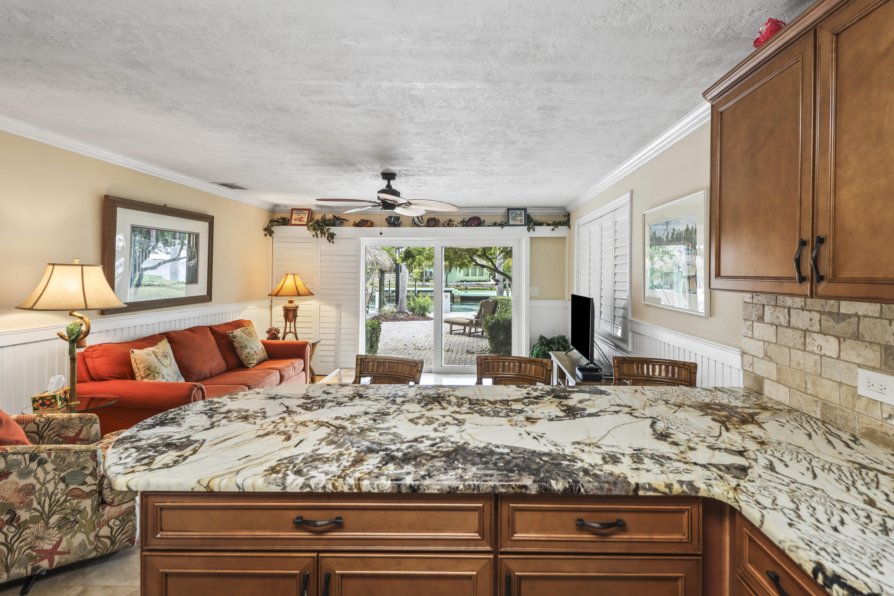 116 Indies Drive North Marathon, FL 33050 - Photo 8 of 67 a living room with granite countertop furniture and a rug