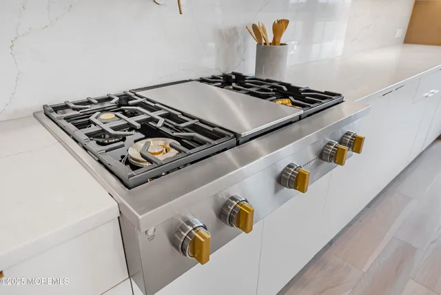 a close up of a stove top oven sitting on a shelf