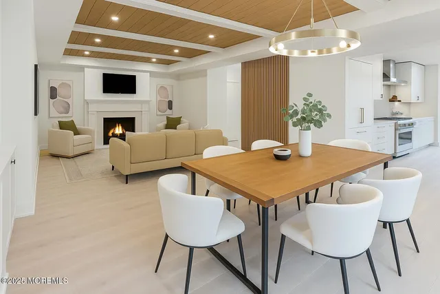 a view of a livingroom with furniture and a fireplace