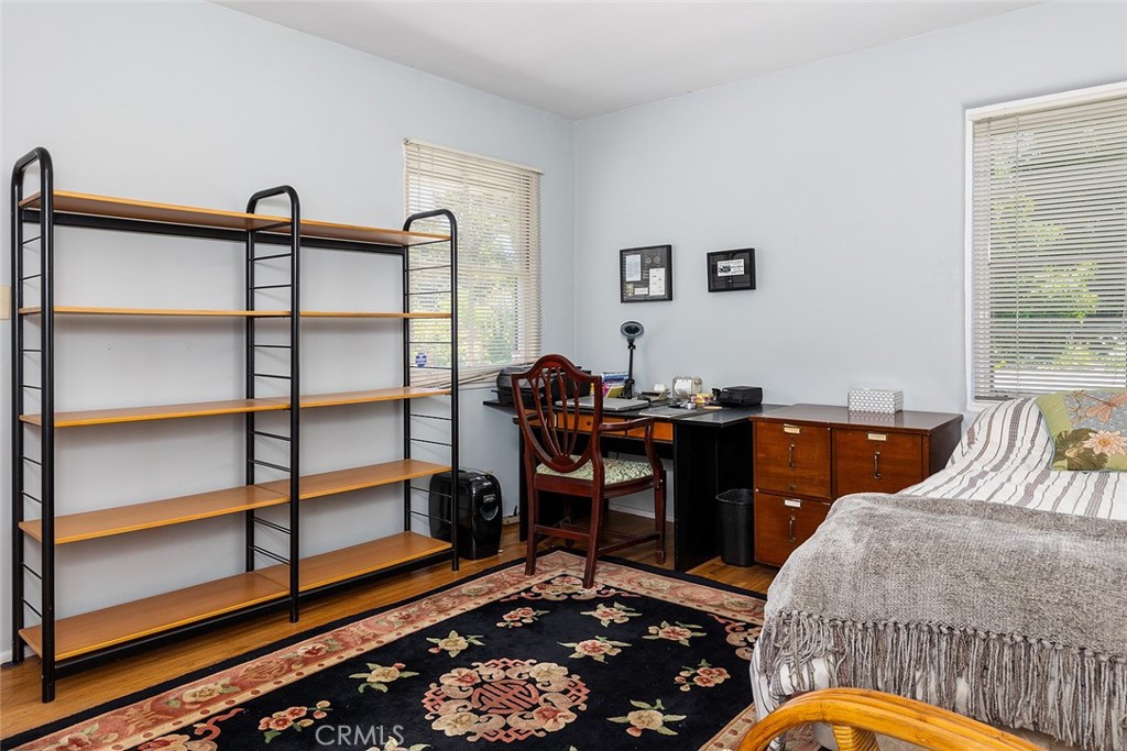 3280 Orlando Road Pasadena, CA 91107 - Photo 16 of 26 a bedroom with furniture and a window
