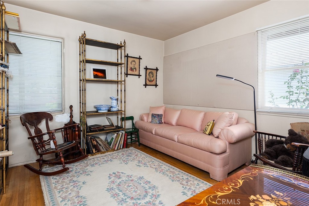 3280 Orlando Road Pasadena, CA 91107 - Photo 21 of 26 a living room with furniture rug and a window