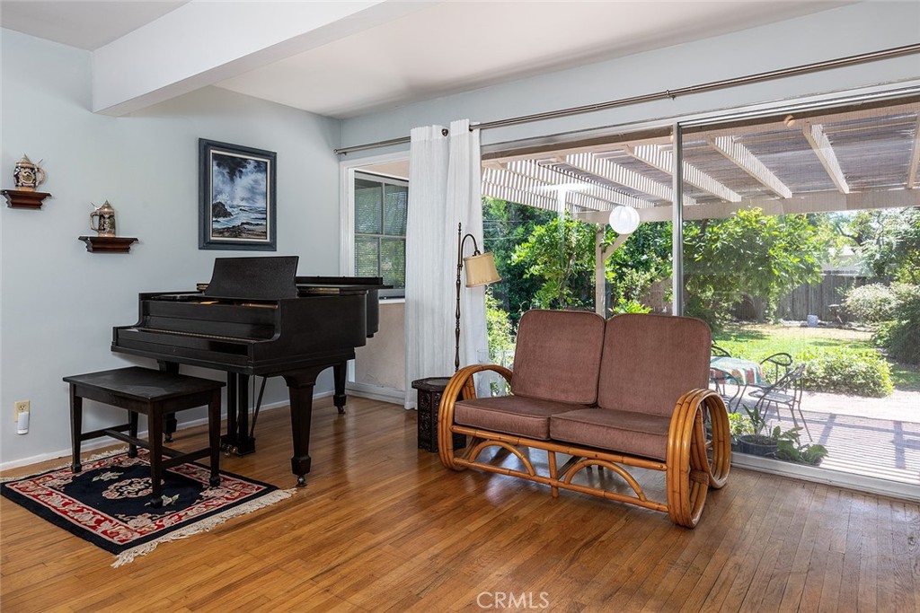3280 Orlando Road Pasadena, CA 91107 - Photo 8 of 26 a living room with furniture and a wooden floor