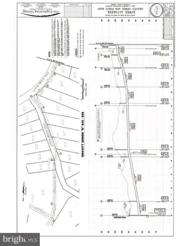 a black and white photo of a bench