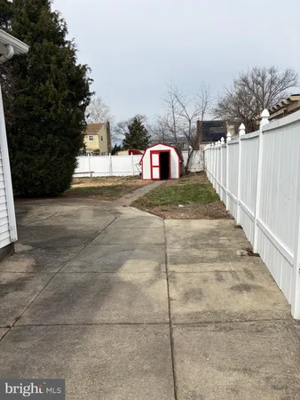 a view of a yard with a trees