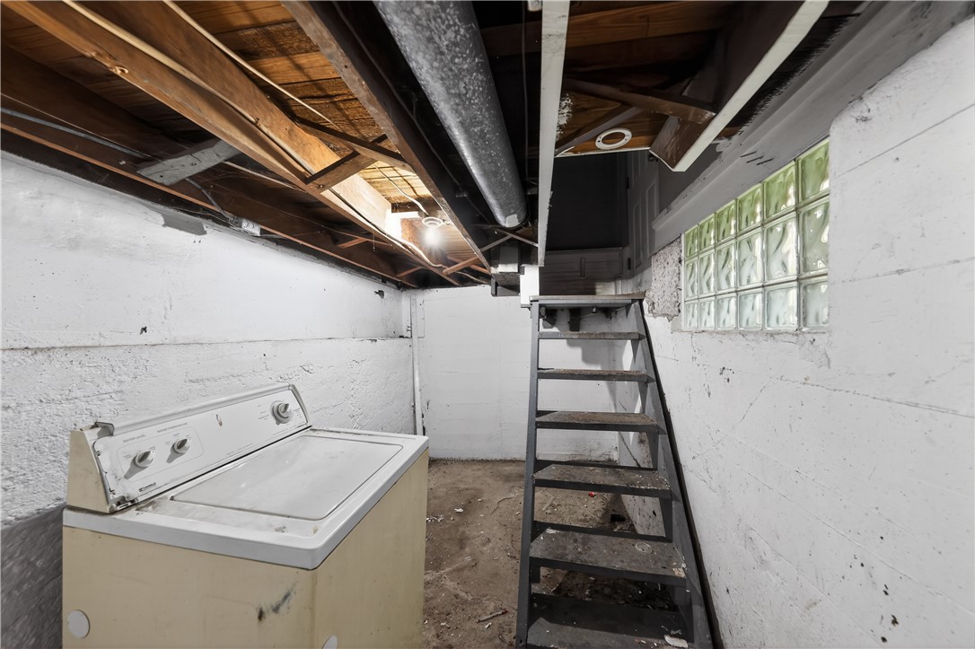 205 Rita Street Dayton, OH 45404 - Photo 22 of 34 This functional basement space provides practical utility and direct access to upper levels.