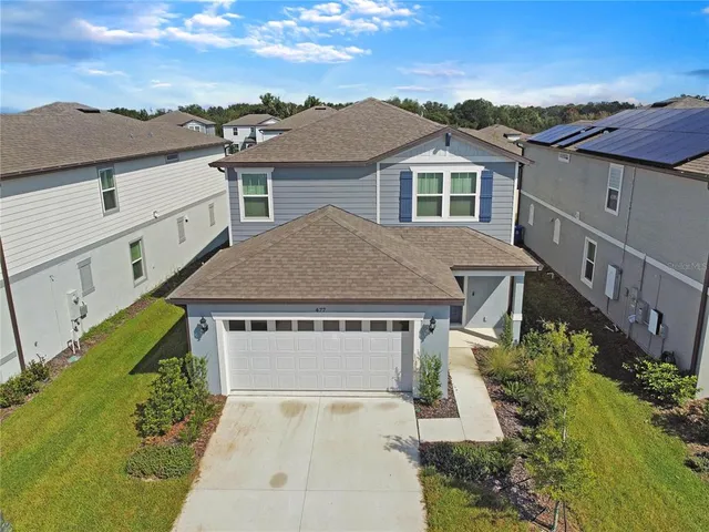 a aerial view of a house yard