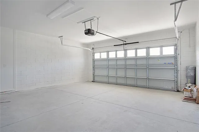 a view of house with backyard