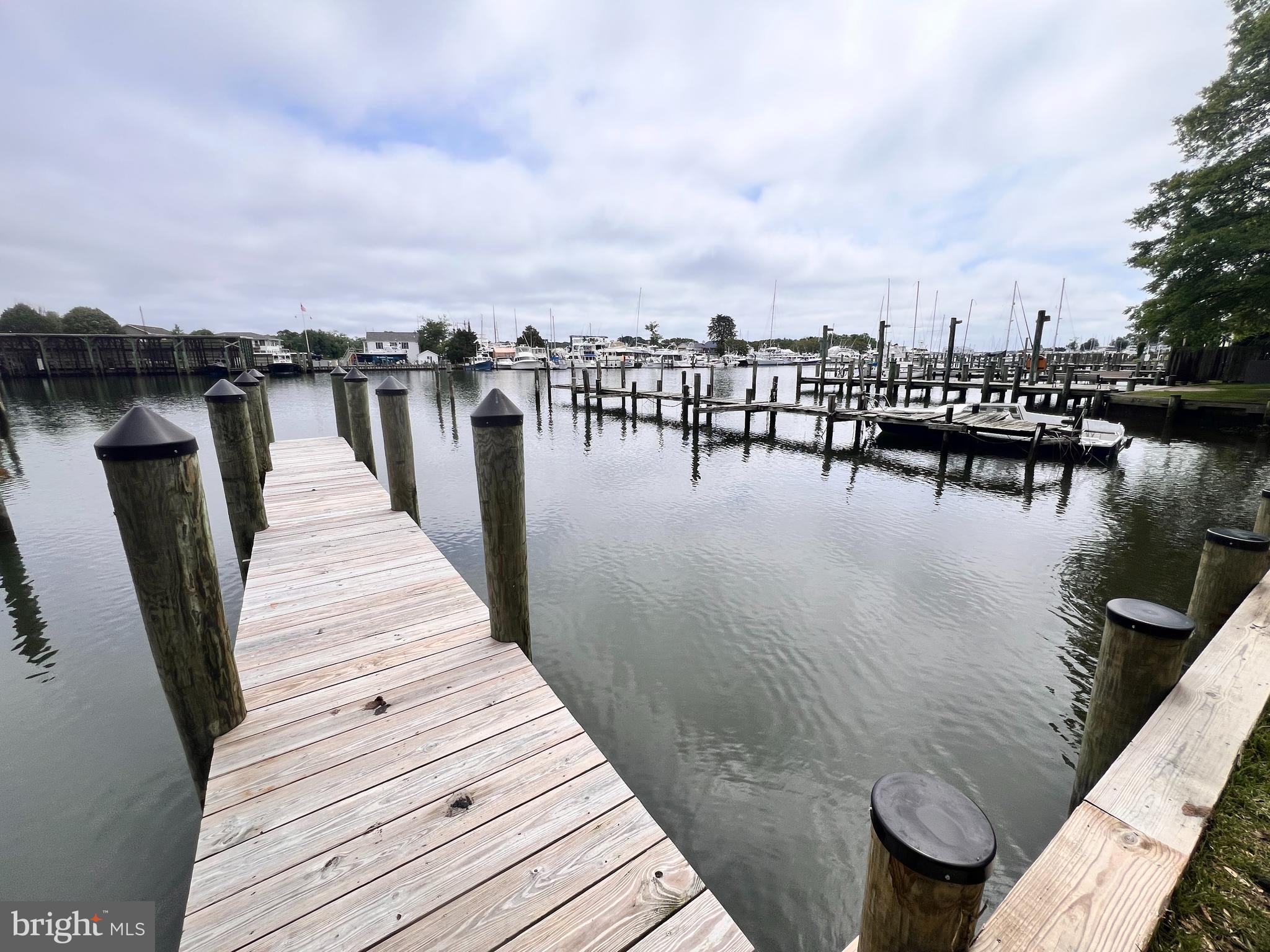 14478 Solomons Island Road South Solomons, MD 20688 - Photo 7 of 12 a view of a roof deck with sitting area