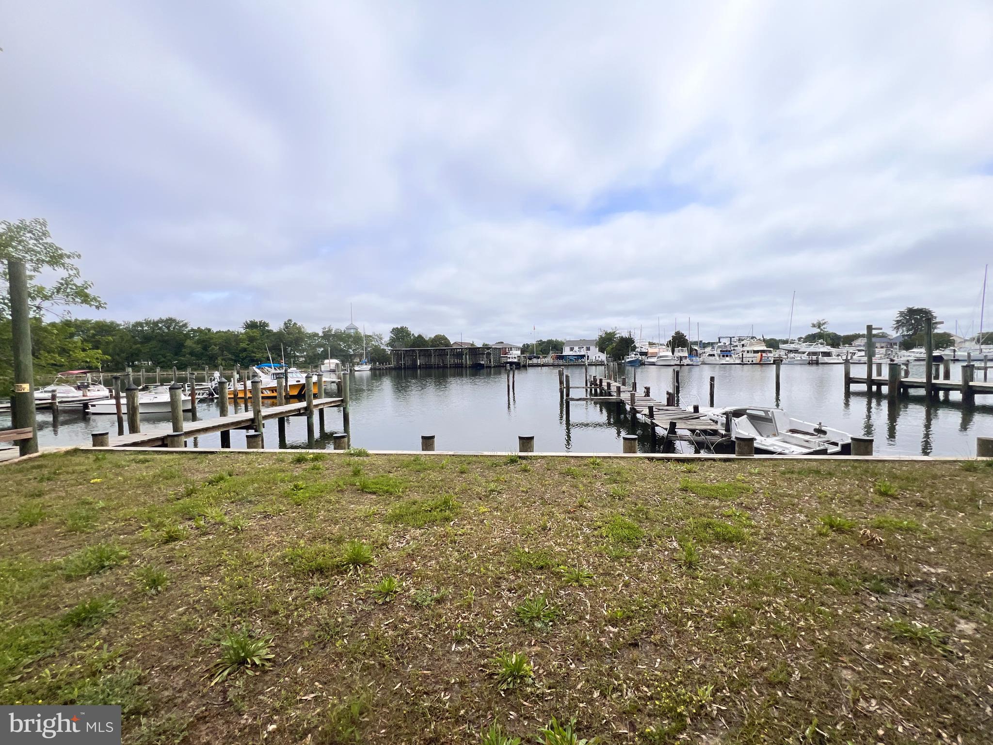 14478 Solomons Island Road South Solomons, MD 20688 - Photo 8 of 12 a view of a lake with houses