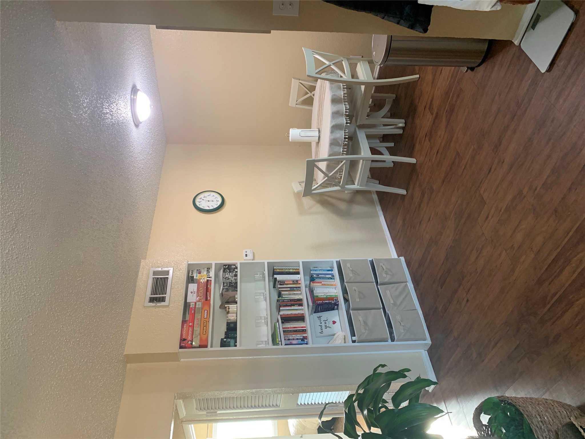 2401 Manor Road, Unit 218 Austin, TX 78722 - Photo 7 of 15 a dining room with a wooden floor and breakfast area