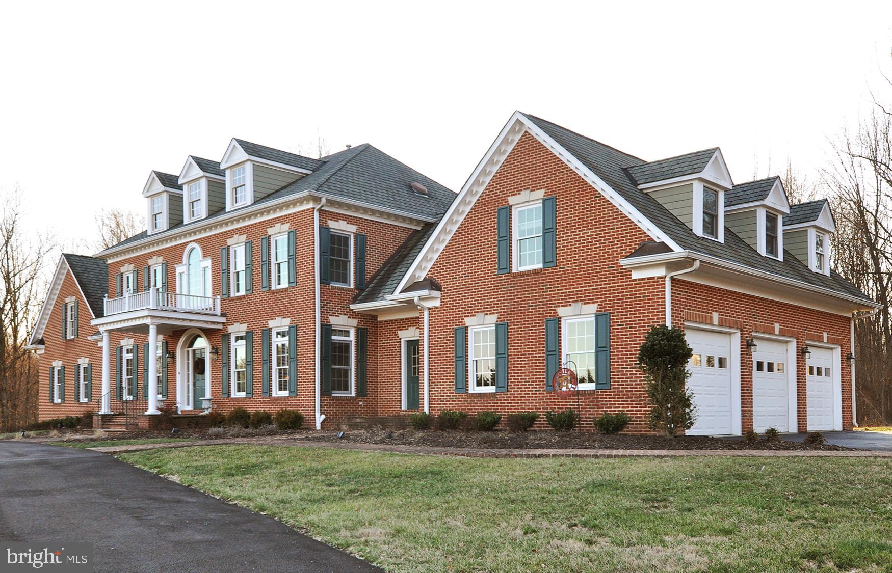 1342 Excaliber Lane Silver Spring, MD 20906 - Photo 2 of 33 Circular driveway & three car side load garage.