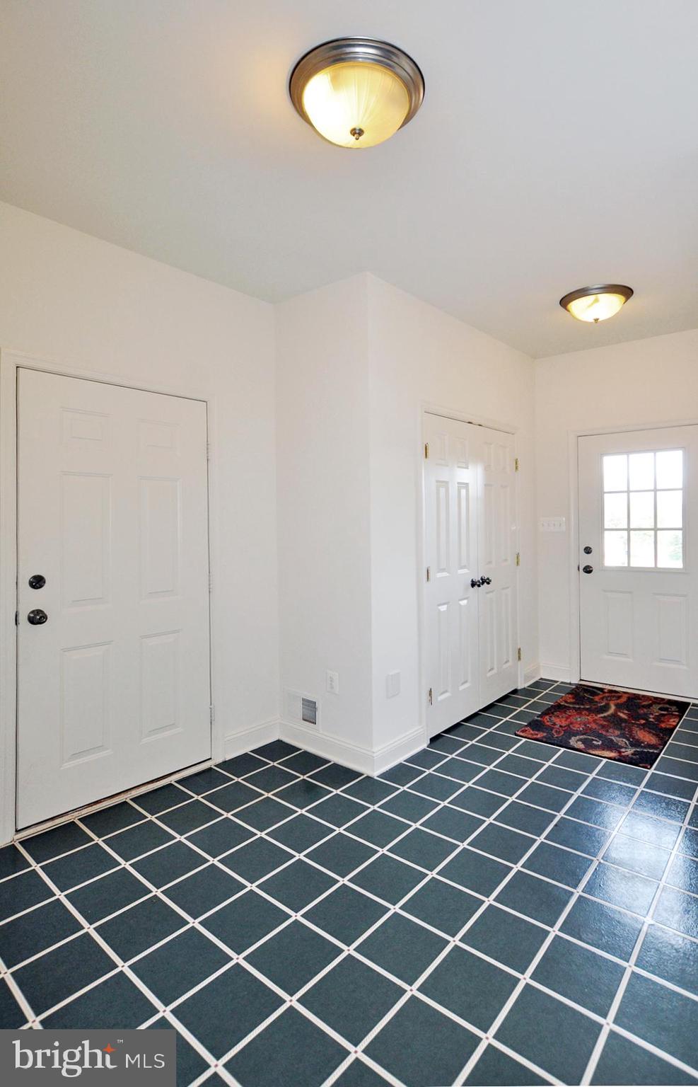 1342 Excaliber Lane Silver Spring, MD 20906 - Photo 17 of 33 Mud room with coat closet and entry from garage.