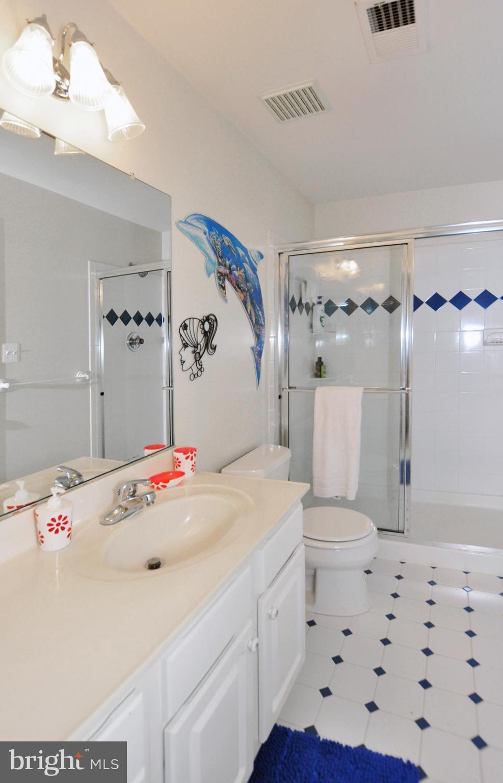 1342 Excaliber Lane Silver Spring, MD 20906 - Photo 21 of 33 Hall bath with custom ceramic tiling.