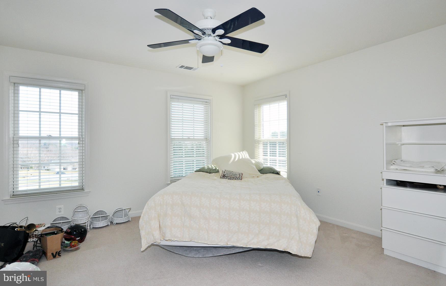 1342 Excaliber Lane Silver Spring, MD 20906 - Photo 23 of 33 Upper level bedroom w/lighted ceiling fan.