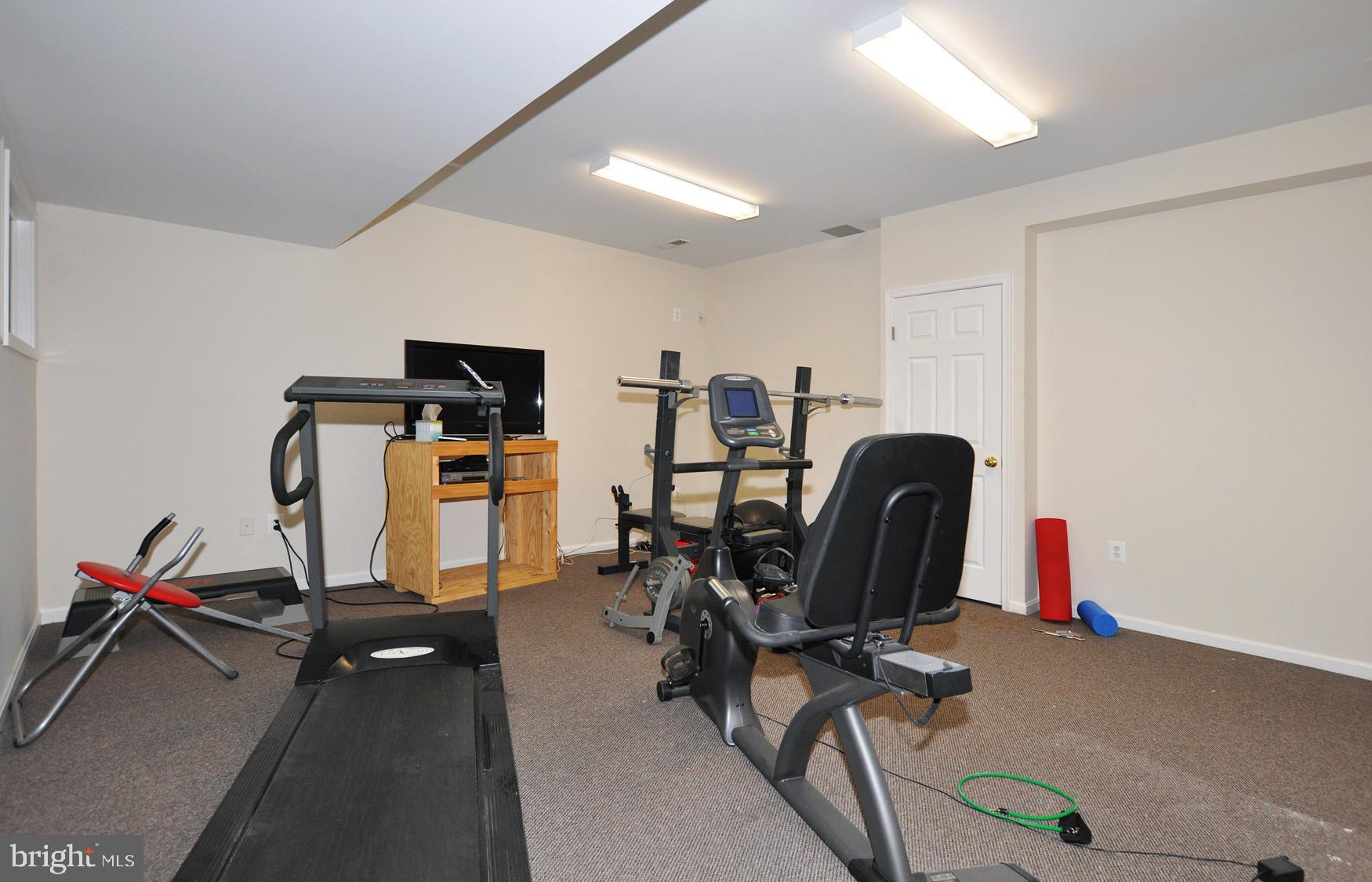 1342 Excaliber Lane Silver Spring, MD 20906 - Photo 30 of 33 Separate exercise room off Game room area.