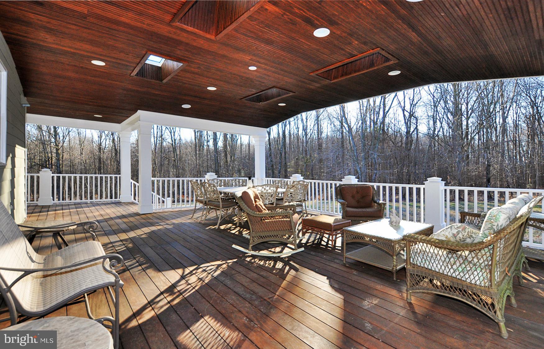 1342 Excaliber Lane Silver Spring, MD 20906 - Photo 4 of 33 Deck with custom Brazilian Hardwoods & wooded view