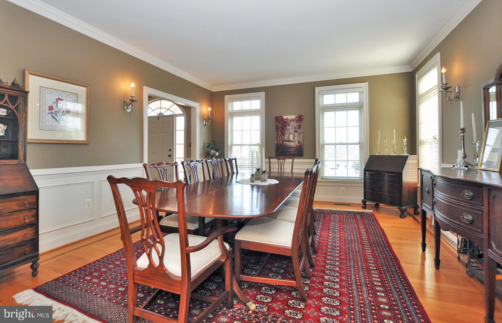 1342 Excaliber Lane Silver Spring, MD 20906 - Photo 8 of 33 Dining for 12 with custom Wainscoting & hardwoods!