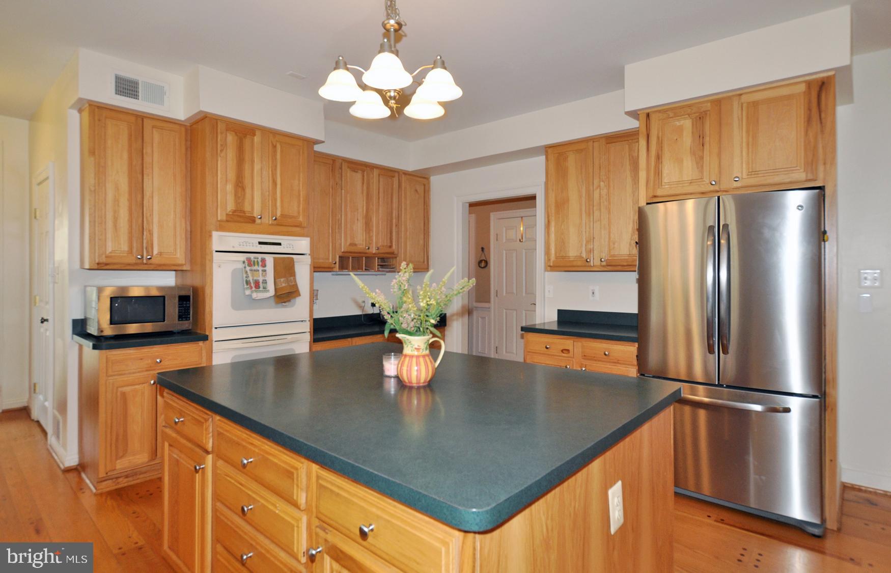 1342 Excaliber Lane Silver Spring, MD 20906 - Photo 9 of 33 Country kitchen w/center island & Stainless Steel