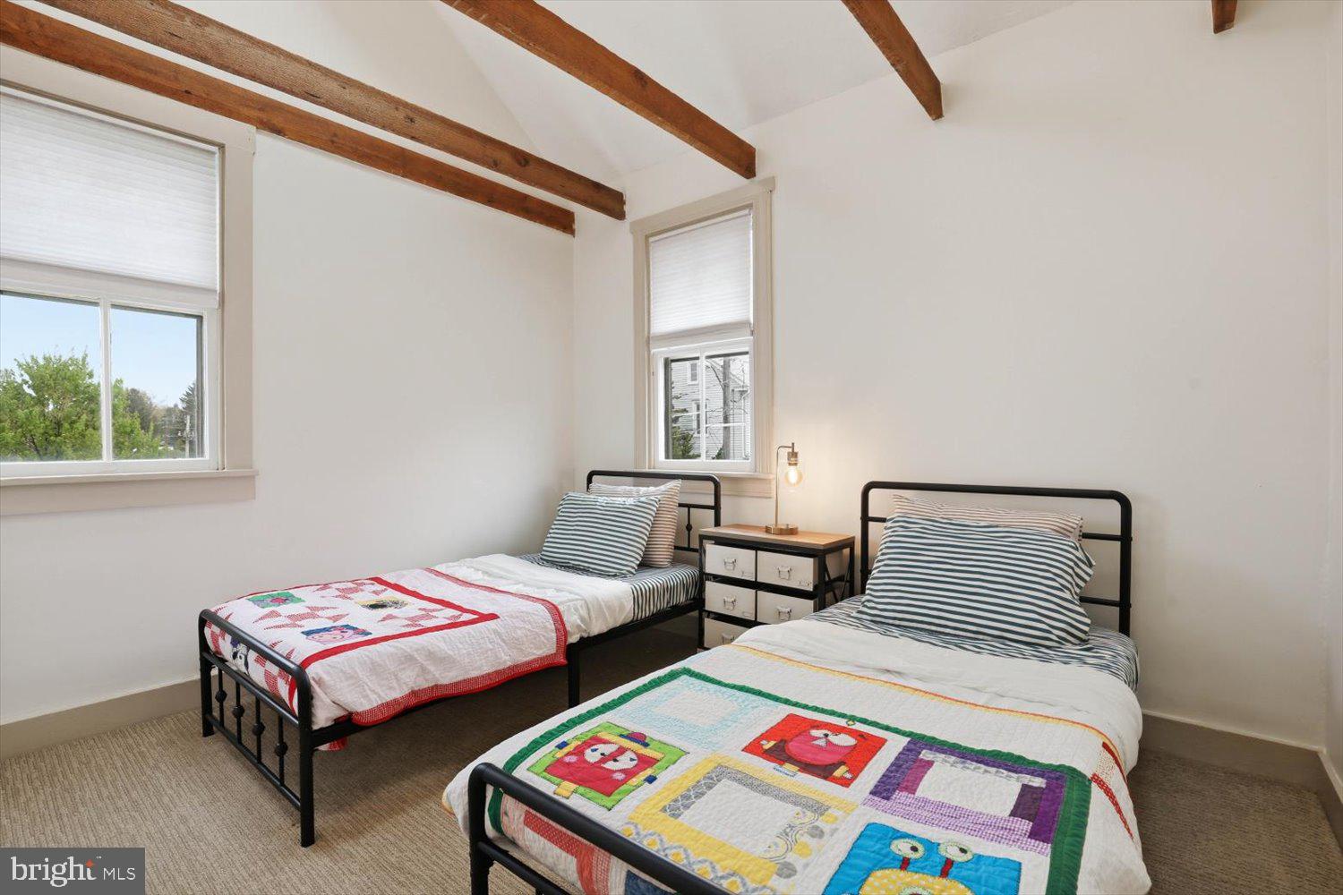 135 South Cedar Street Lititz, PA 17543 - Photo 30 of 52 a bedroom with two beds and a table