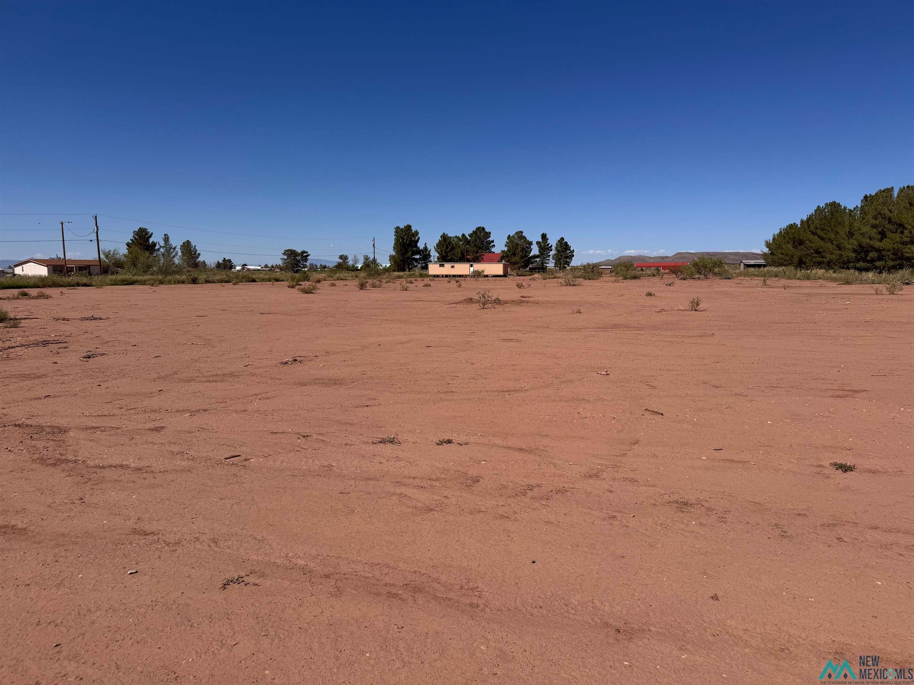 77 Northwest Bookout Road Tularosa, NM 88352 - Photo 24 of 33 View of yard with a view of countryside