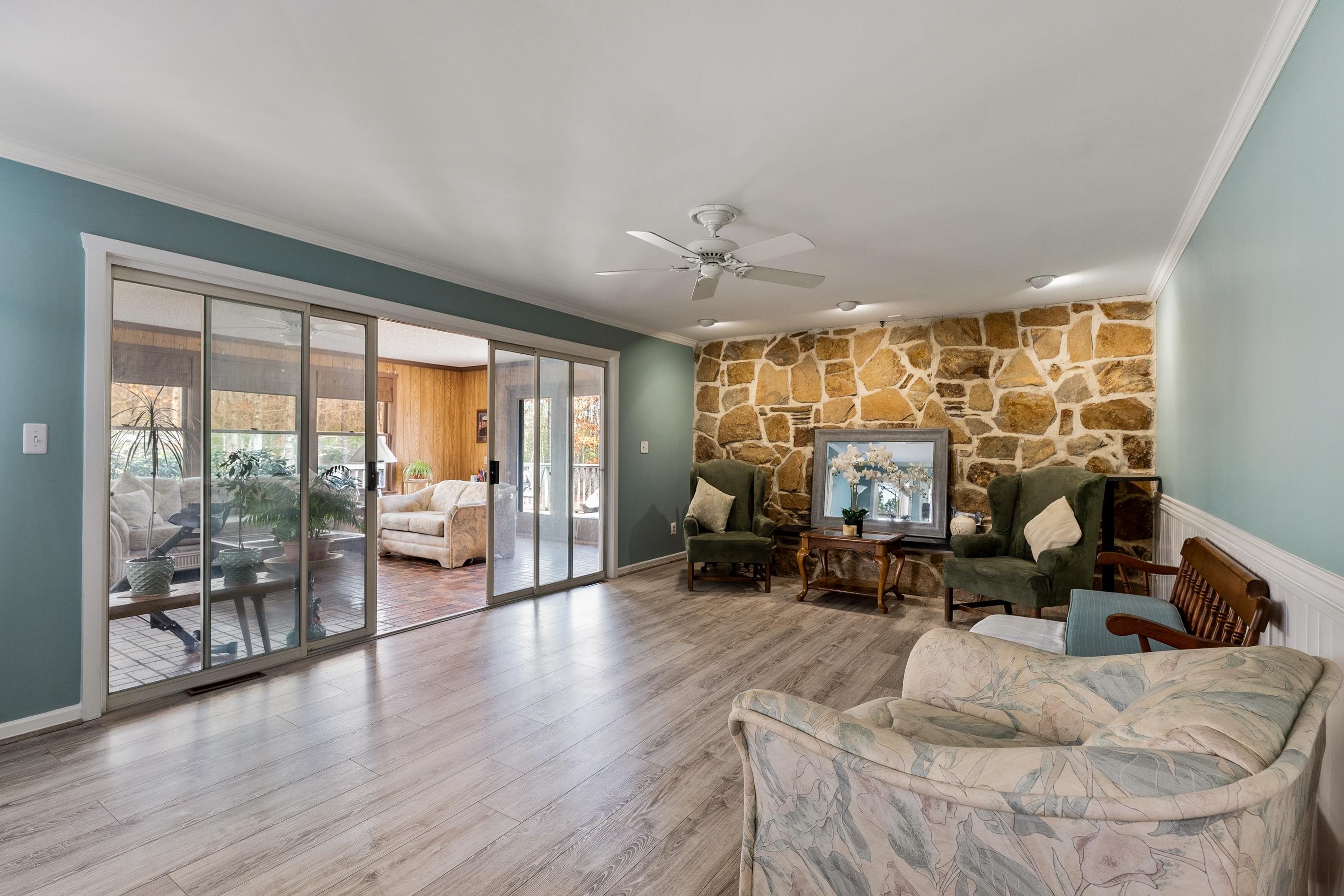 95 Peach Orchard Road Ocean View, NJ 08230 - Photo 14 of 41 a living room with furniture large window and a table