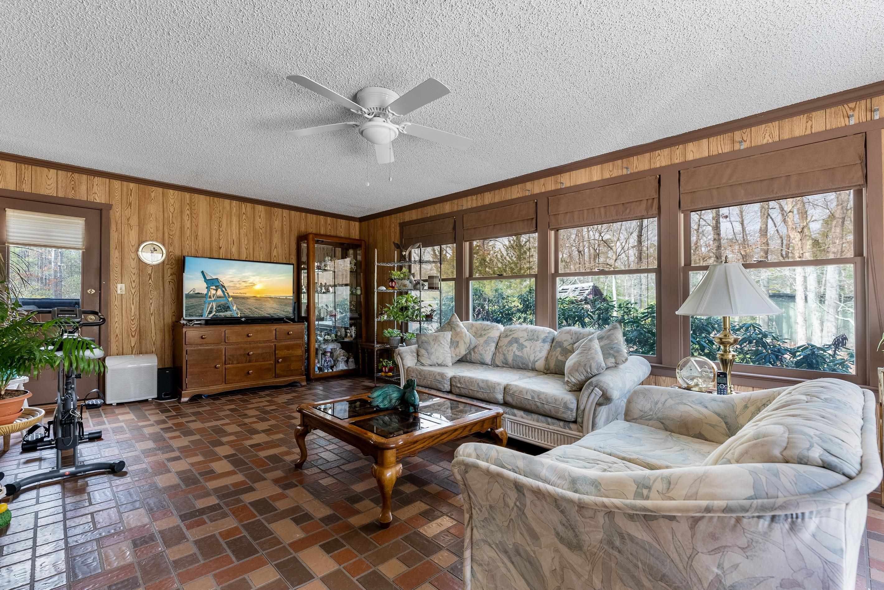 95 Peach Orchard Road Ocean View, NJ 08230 - Photo 16 of 41 a living room with furniture and a large window