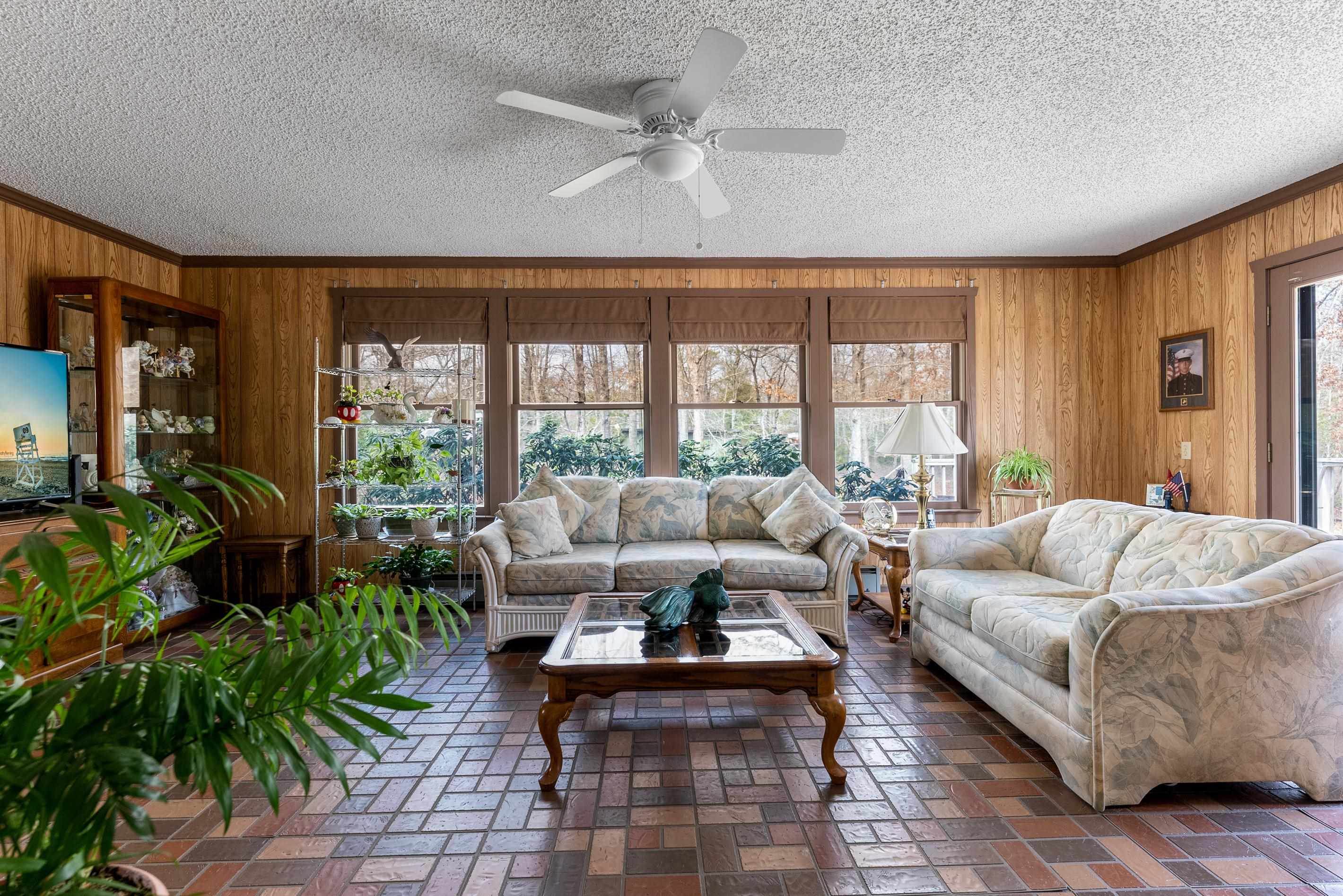 95 Peach Orchard Road Ocean View, NJ 08230 - Photo 17 of 41 a living room with furniture and a large window