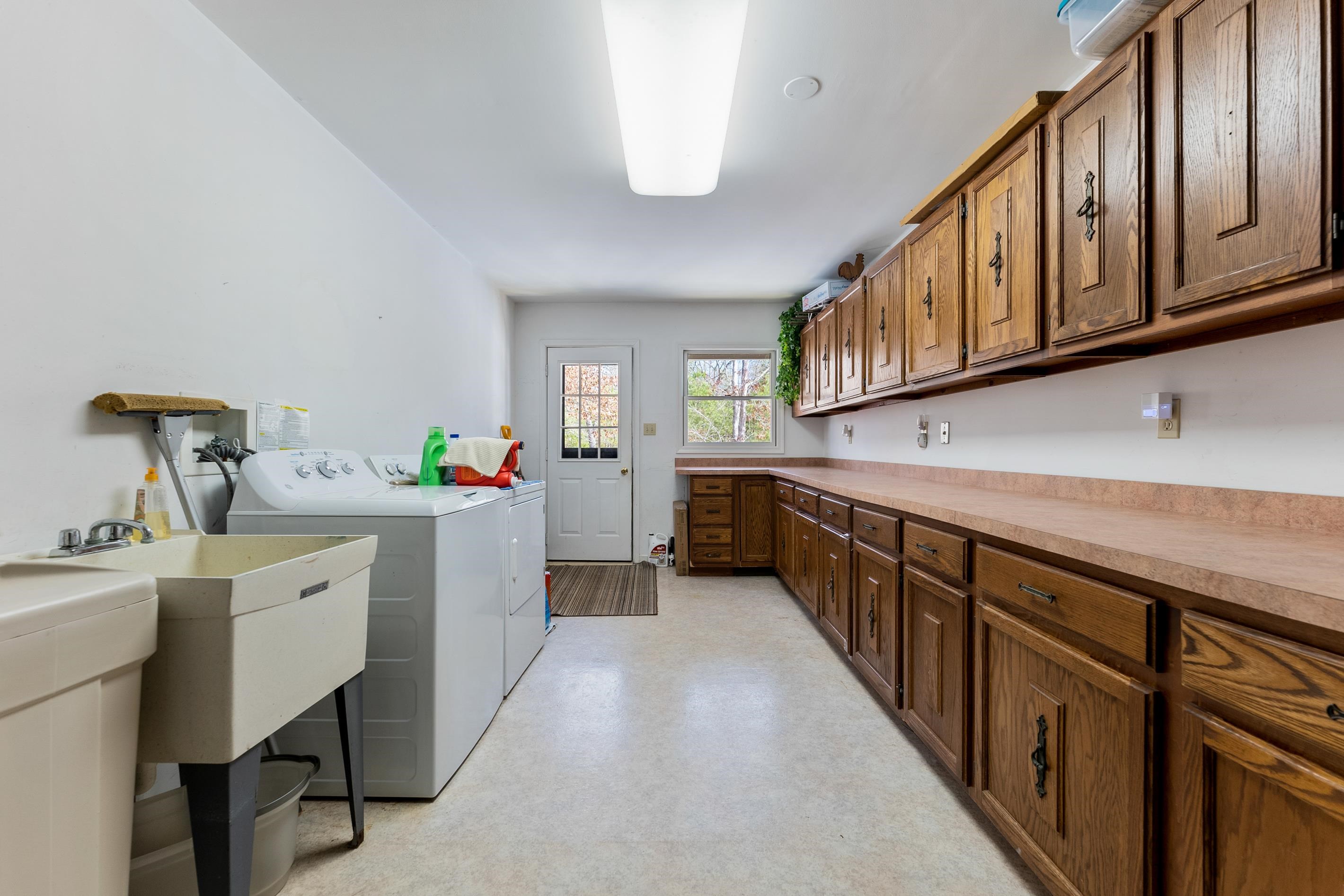 95 Peach Orchard Road Ocean View, NJ 08230 - Photo 19 of 41 a kitchen with stainless steel appliances granite countertop a sink and cabinets