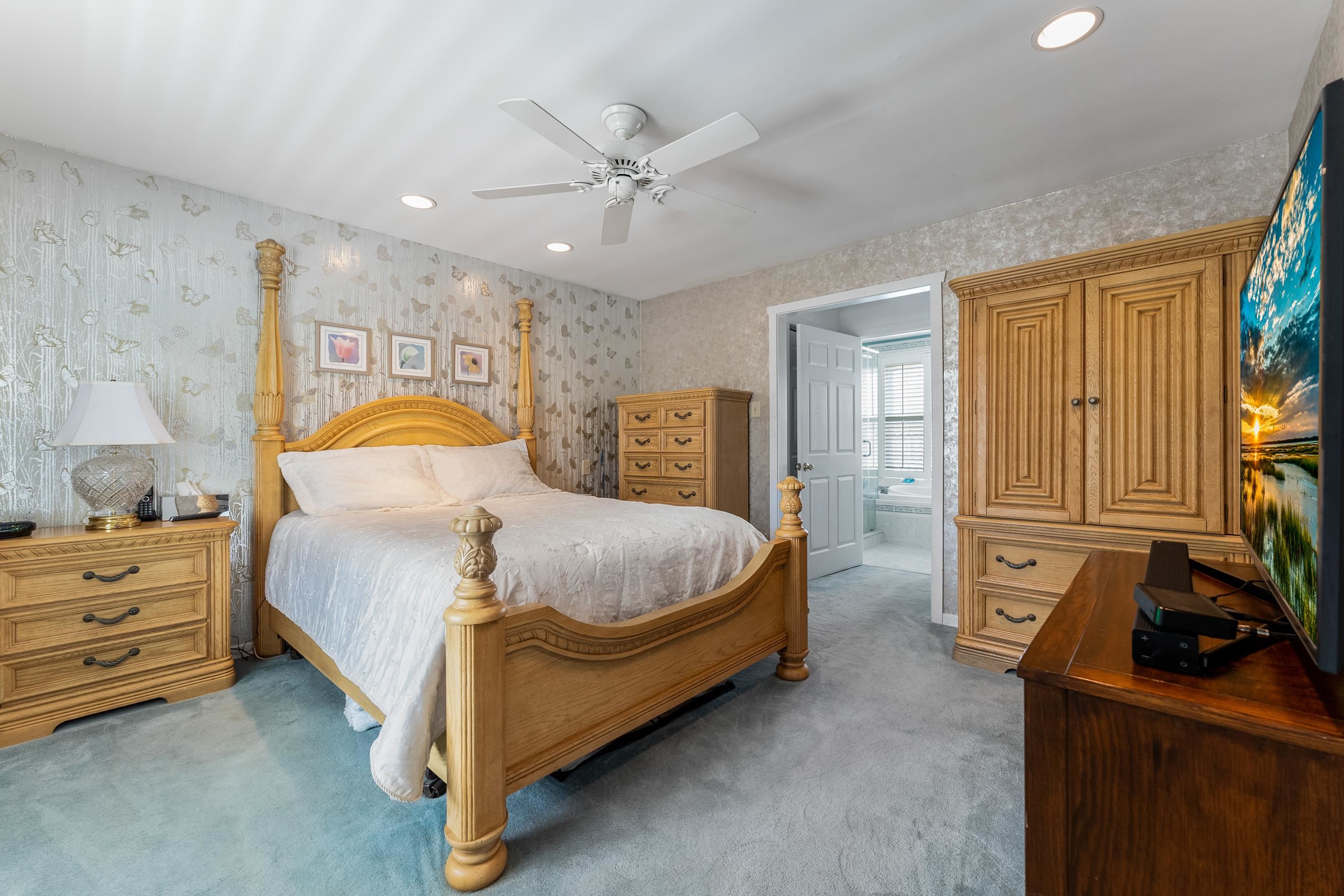 95 Peach Orchard Road Ocean View, NJ 08230 - Photo 20 of 41 a bedroom with a bed and dresser