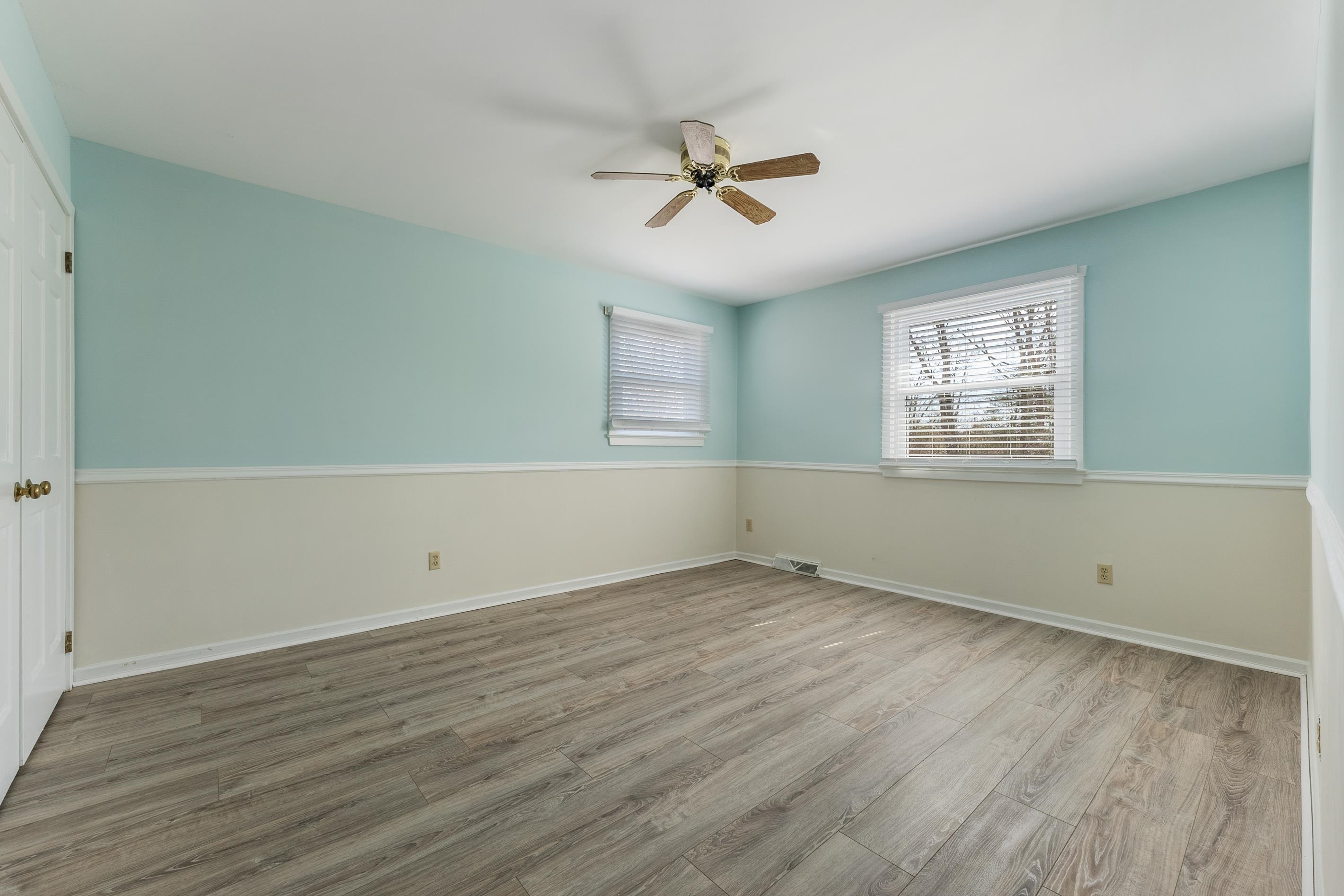 95 Peach Orchard Road Ocean View, NJ 08230 - Photo 28 of 41 a view of an empty room with wooden floor and a window