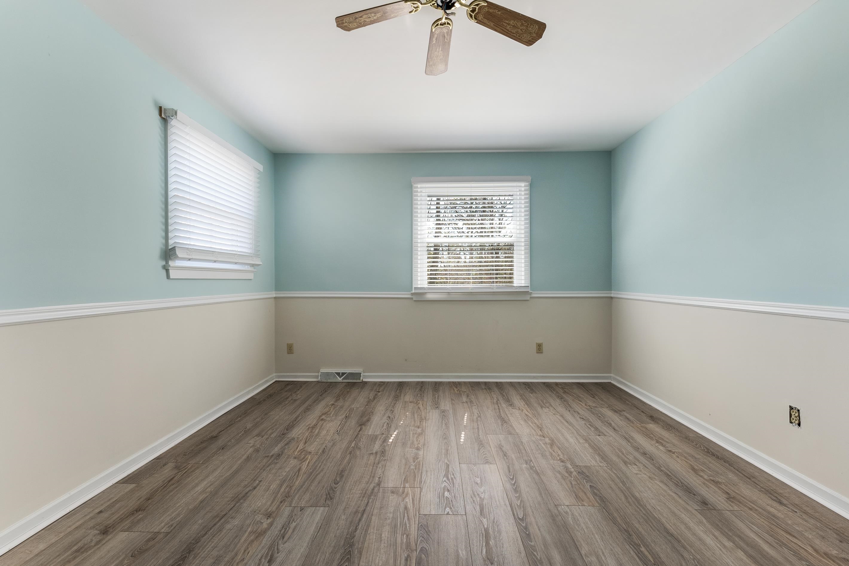 95 Peach Orchard Road Ocean View, NJ 08230 - Photo 30 of 41 an empty room with a window and a ceiling fan