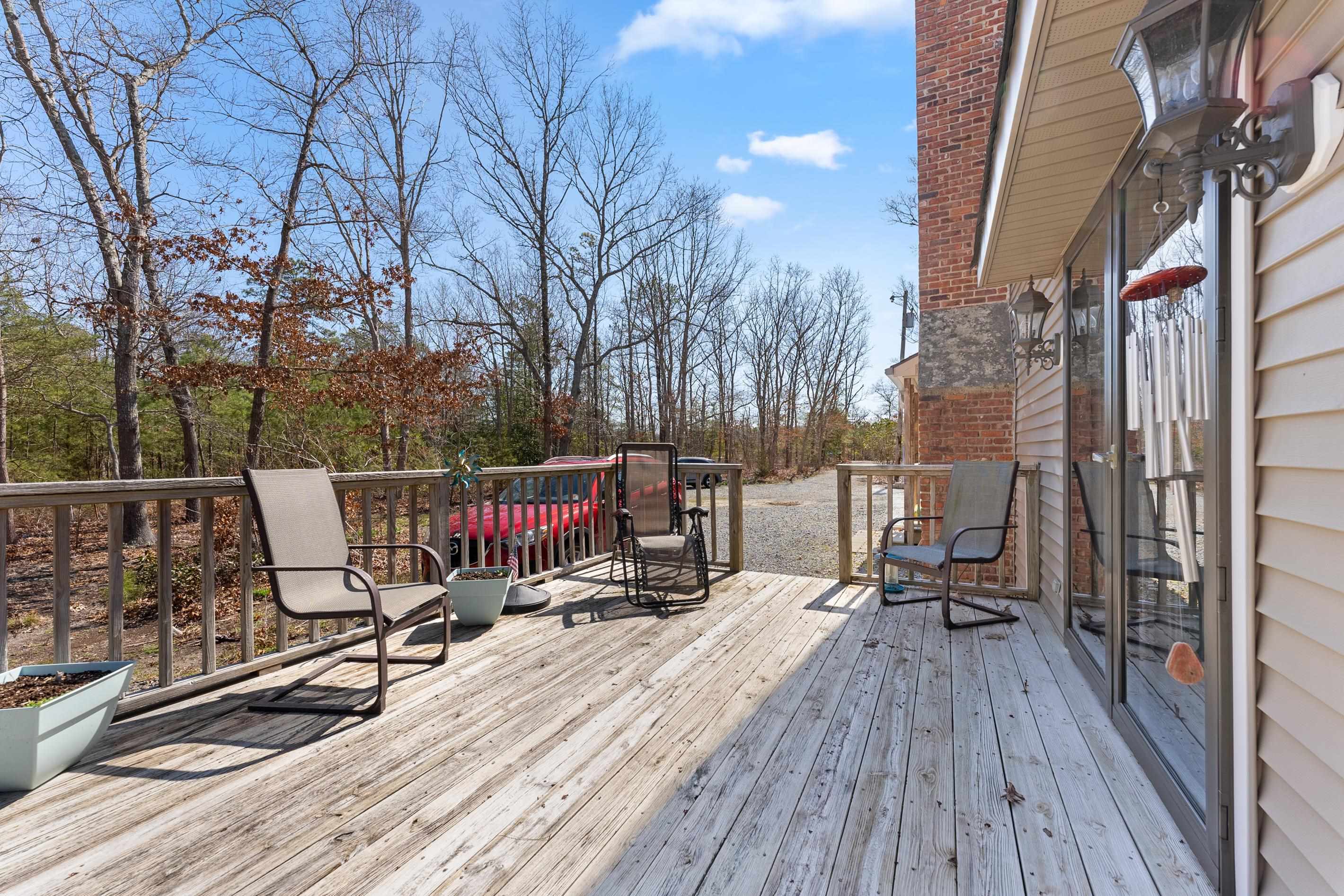 95 Peach Orchard Road Ocean View, NJ 08230 - Photo 34 of 41 a view of roof deck with wooden floor and fence