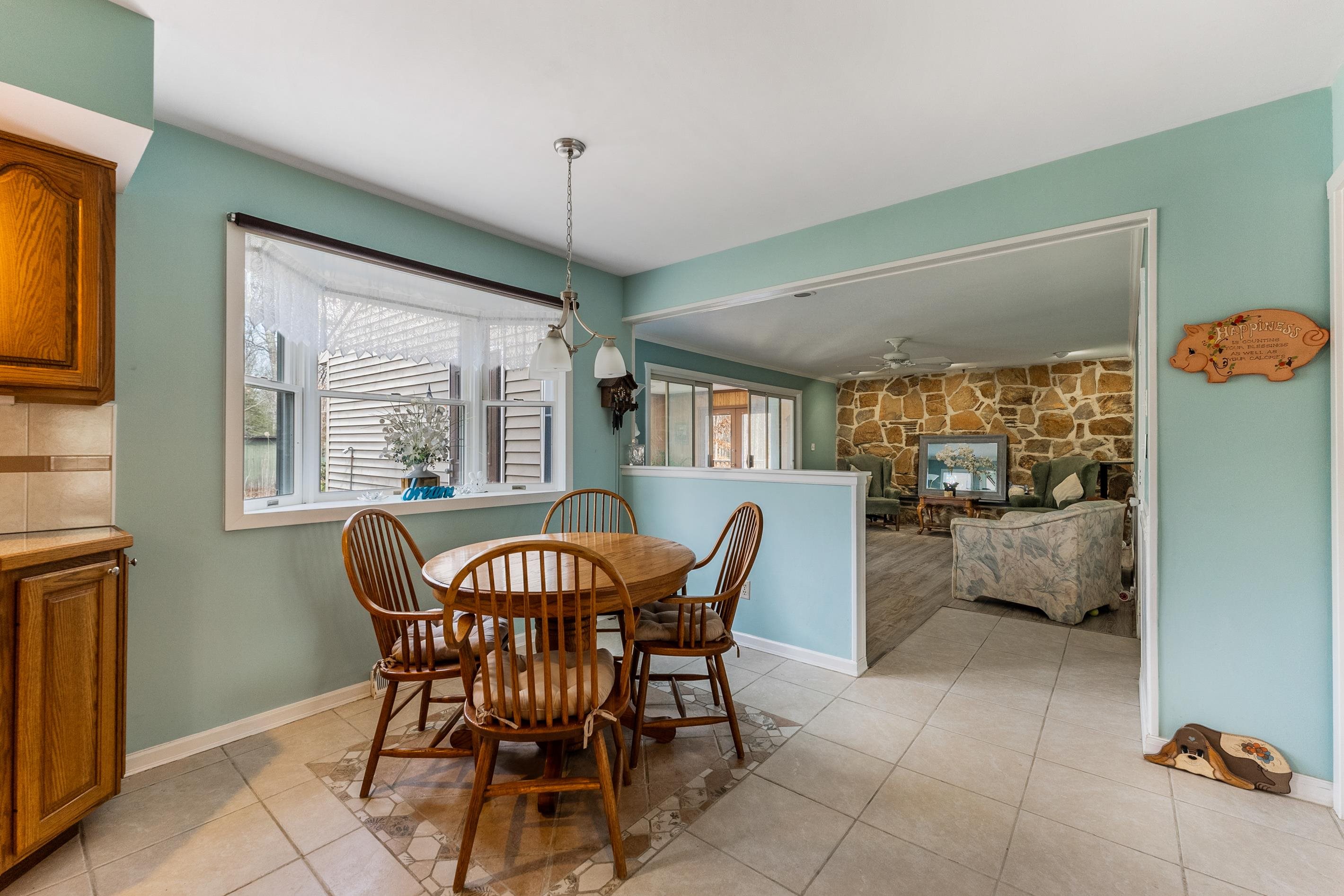 95 Peach Orchard Road Ocean View, NJ 08230 - Photo 9 of 41 a view of a dining room with furniture window and outside view