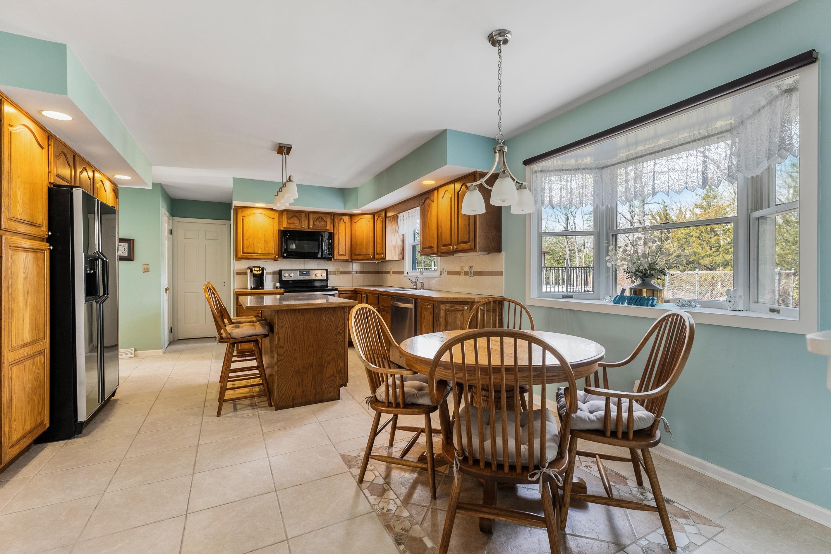 95 Peach Orchard Road Ocean View, NJ 08230 - Photo 10 of 41 a dining room with furniture and window