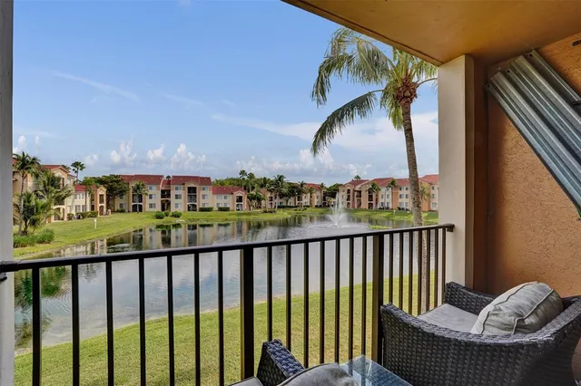 a view of balcony with furniture